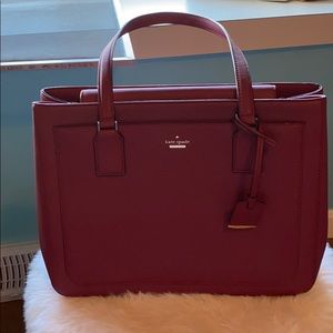 Burgundy Kate Spade purse. Never been used